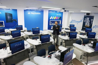Illustration for article titled University's PlayStation Classroom has DualShock Desks